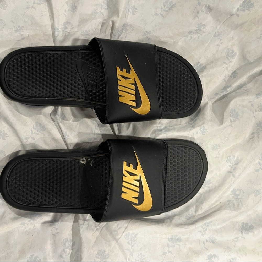 Nike Black Slides with Gold Logo